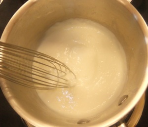 This is how the white sauce will look once all the floury clumps are worked in to the milk.