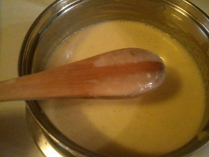 When the cream doesn't slip back into the channel on the spoon, it's called nappé, and it means your custard is done.